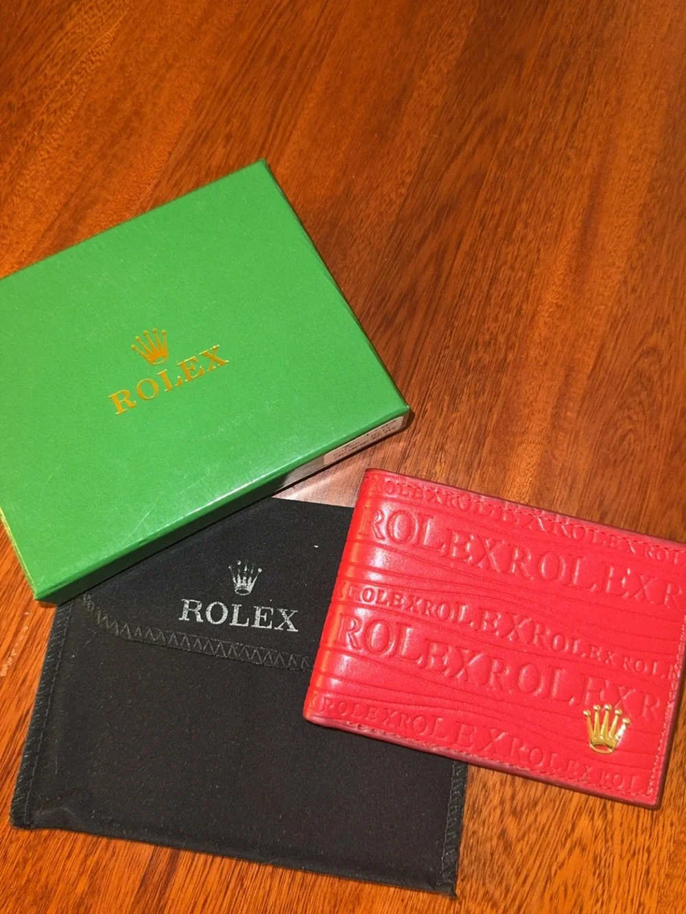 Rolex Red Embossed Leather Card Holder with Gold Logo